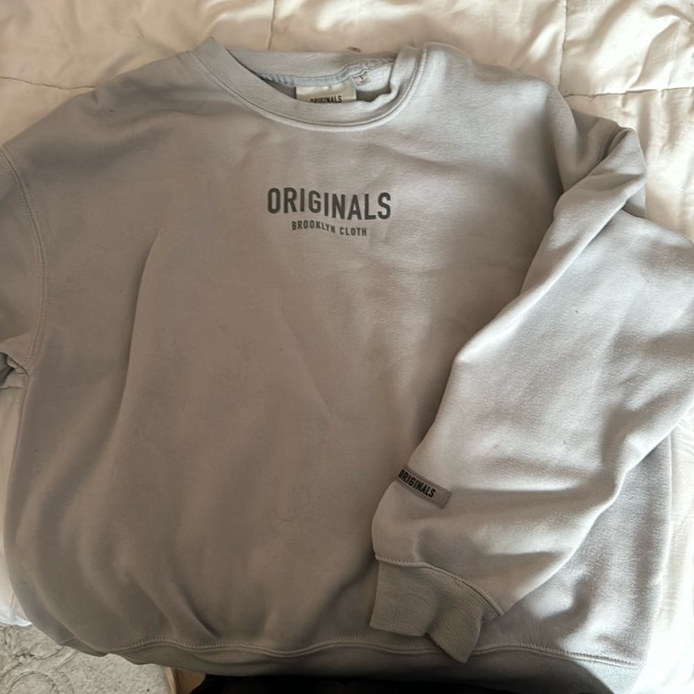 it’s an originals jacket keeps you warm and very good quality